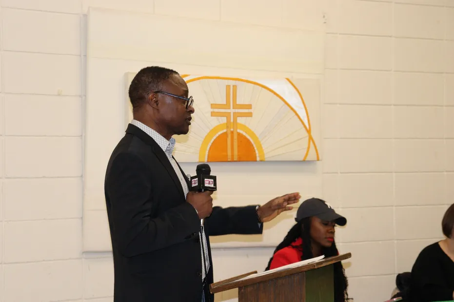 Wynfred Russell addressing an audience